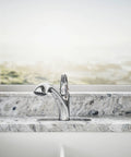 Jolt Pull-Out Kitchen Faucet With Two-Function Sprayhead, Touch Control, 1.5 GPM, Chrome Finish on stone countertop deck