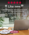 Open laptop on a desk with Weiman branding, plant, and glasses, promoting Disinfecting Tech Wipes 99.9 Percent Germ Killer For Phones.