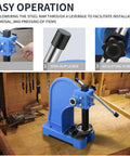 Built Different One Ton Manual Arbor Press With Four Position Steel Anvil And Five Point Five Inch Work Height for pressing items.