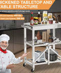 Slick Stainless Steel Folding Kitchen Cart Rock Solid Three Tier Rolling Utility Station with condiments and kitchen tools.