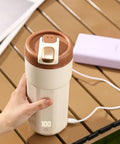 Self Heating Coffee Mug With Quick Temperature Display And Totally Spill Proof Lid, 550 mL portable cup with temperature readout.