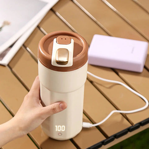 Self Heating Coffee Mug With Quick Temperature Display And Totally Spill Proof Lid, 550 mL portable cup with temperature readout.