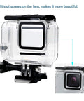 Hero 7 White And Silver Waterproof Housing Case with 30m depth and anti fog inserts, close-up of lens area, heavy duty protective shell.