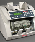 No Sweat Currency Counting Machine For St Lucia And Antigua Barbuda with cash stacks in grey background