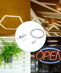 Ceiling Hanging Wire Cable Kit For Pendant Lights And Aquarium Lighting Two Meter Length Two Pack Adjustable Suspension Rope Clamps Chrome Finish Steel Wire For Small Diameter Cables Style One displayed next to hanging lights and greenery.