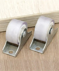 Close-up of two one inch directional caster wheels from 12 Pack One Inch Directional Caster Wheels With Sturdy Flat Plate Base