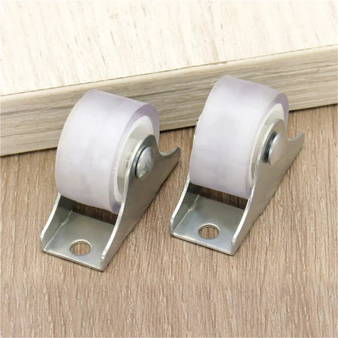 Close-up of two one inch directional caster wheels from 12 Pack One Inch Directional Caster Wheels With Sturdy Flat Plate Base