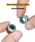 Close-up of fingers holding Set Of 3 One Way Needle Roller Bearings HF081412 With 8mm Bore, 14mm OD, 12mm Width for heavy-duty use.