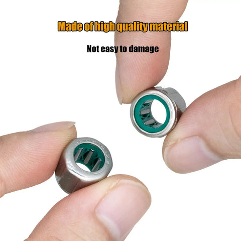 Close-up of fingers holding Set Of 3 One Way Needle Roller Bearings HF081412 With 8mm Bore, 14mm OD, 12mm Width for heavy-duty use.