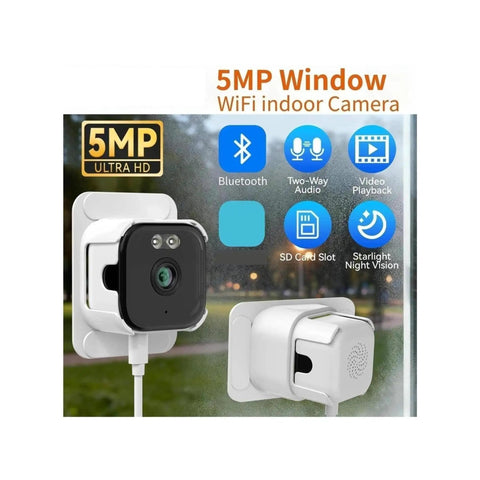 Hella Crisp 2K Cube Security Camera With Window Lens And Dual Band WiFi Live View AI Human Detection Full Color Night Vision Two Way Chat Built In Siren And 24 7 Loop Recording For Total Home Safe Vibes mounted on a wall with power cord.