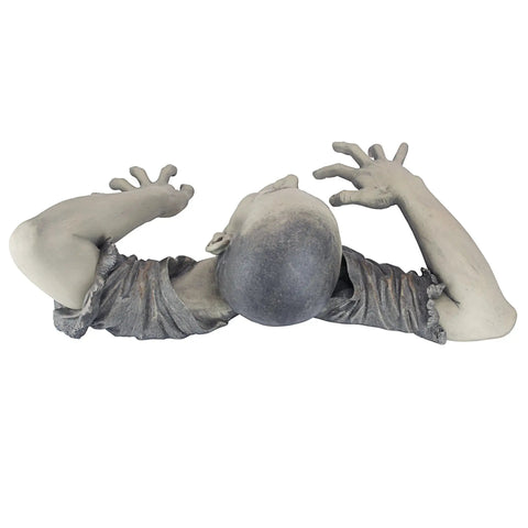 Top view of Zombie Of Montclaire Moors Indoor Outdoor Garden Statue, creepy ghoul with outstretched arms, full color finish, 31 inches wide