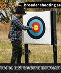 Person adjusting Pro Grade Backyard Archery Target Paper 31.5 By 31.5 Inches Thick 14mm 120g Wood Free Paper 10 ring scoring