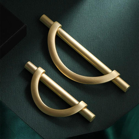 Brushed Gold Half Moon Cabinet Pulls Set of 2, 3.75 Inch Length on fabric background