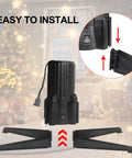 Indoor scene with black stand and two adjustable fittings for artificial trees, Christmas background, remote control.