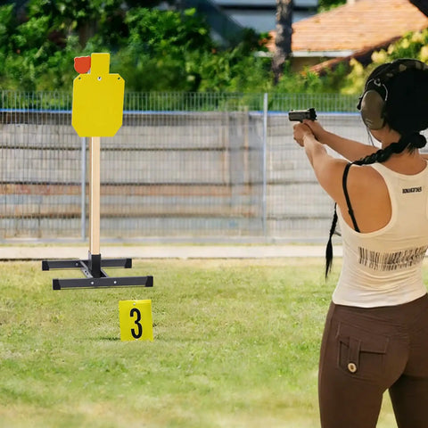 Shooting practice with AR500 Hardened Steel Shooting Target System With Three Eighths Inch Thick Reactive Hostage Target outdoors.