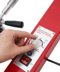 Hand adjusting settings on Spot Tire Vulcanizing Kit For Cars And Trucks 110V With 6 Molds, DIY Garage Tire Repair Tool