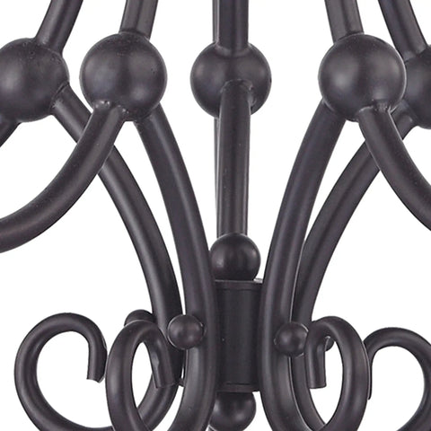 Close-up of metal details on Williamsport 5 Light Chandelier in Oil Rubbed Bronze Finish 20 Inch Wide Traditional Ceiling Fixture for Living Room or Foyer Hardwired Metal Mount Uses 60 Watt B11 Candelabra Bulbs Not Included.