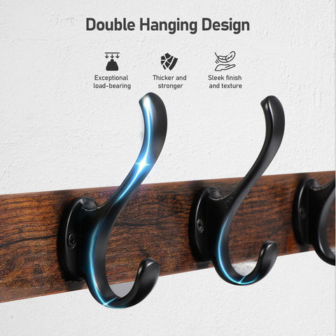 Close-up of black metal hooks on a rustic wood panel, part of 29 Inch Rustic Wall Coat Rack With Shelf And Hooks Entryway Organizer For Living Room Bedroom Or Bathroom Heavy Duty Black Finish 80 Lbs Capacity Perfect Storage And Display