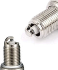 Top Shelf F7TC Ceramic Spark Plugs For Small Engines Two Piece Set, detailed view of copper core and alumina insulation.