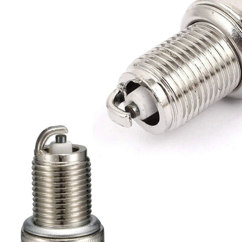 Top Shelf F7TC Ceramic Spark Plugs For Small Engines Two Piece Set, detailed view of copper core and alumina insulation.