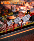 Pro Grade All In One DIY Electronics Crimping Tool Kit With 22 JST Connectors on circuit board with wiring safety message