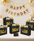 Five Senses Gift Bag Set For Him with Labels and Tissue Paper, medium black gift bags with sensory labels in a birthday setting