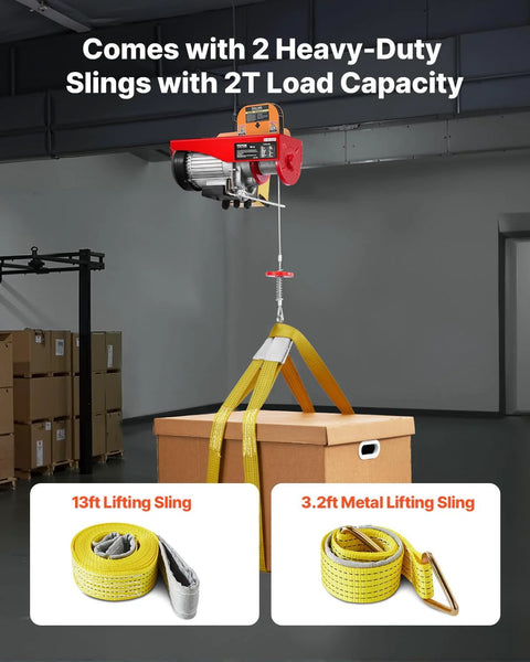 VEVOR electric hoist with wired remote control, red unit lifting a cardboard box with yellow lifting slings