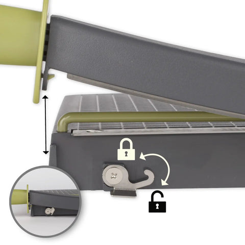 Close-up of locking mechanism on ClassicCut Lite 12 Inch Guillotine Paper Cutter With 10 Sheet Capacity and alignment grid.
