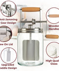 Effortless Hand Crank Butter Churner Fits Classic Mason Jars For Rustic Kitchen Vibes And Making Real Homemade Sweet Cream That The Whole Family Totally Freaks Out Over Daily features wooden handles and stainless steel gear.