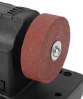Close-up of the sanding wheel on a 20V Cordless Mini Bench Grinder With Dual Wheels For Sharpening Knives Drills And Rust Removal Adjustable Speed Up To 6000Rpm Compact Electric Polishing Machine Compatible With Dc Batteries For Precision Jobs.