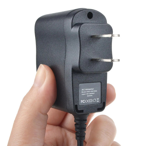 Person holding AC DC Power Adapter Charger For SkyTrak 75SH001 Golf Launch Monitor And Golf Simulator Power Supply