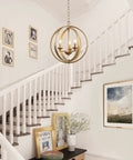 Gold Globe Pendant Light Fixture With Open Metal Spheres For Dining Room Living Room Bedroom Kitchen Island And Foyer Three Light Chandelier For Modern Dope Ambience Gold Finish For A Bright Warm Glow And Contemporary Vibe hanging in staircase