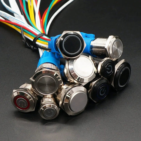 Collection of 12mm momentary push button switches with blue LED rings, metal chassis, and multi-colored wires, suitable for panel mounting.