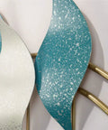 Heavy Duty Wall Mounted Coat Hook With Snowflake Design Iron Wall Hook For Entryway And Bathroom Rust Resistant Metal Hanger For Scarves Umbrellas Bags Keys And Hats Single Unit Silver Finish Home Decor Space Saver close-up view of snowflake design in silver and teal finishes