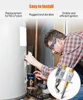 Pilot burner with thermocouple assembly installed beside a water heater; technician at work