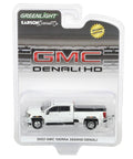 GMC Sierra 3500HD Denali Dually Diecast Truck 1/64 Scale Sick White Frost Exclusive Karson Diecast in packaging, side view.