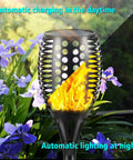 Cool Multicolor Solar Torch Lights Waterproof Outdoor Path Lighting With Dancing Flame Effect 7 Color LED Modes in garden