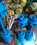 Three blue Rugged 2000W Hydroelectric Generator For Off Grid Power 220V Single Phase Axial Flow Water Turbine units stacked.