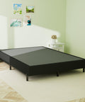 Heavy Duty King Box Spring With Thick Fabric Cover And Reinforced Steel Frame Low Profile Bed Base on light wood floor.
