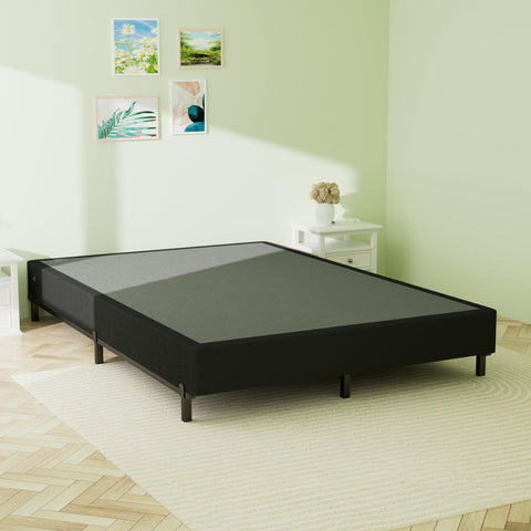 Heavy Duty King Box Spring With Thick Fabric Cover And Reinforced Steel Frame Low Profile Bed Base on light wood floor.