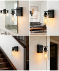 Modern Matte Black Wall Sconces With Clear Glass Shades above bathroom mirror and hallway; versatile farmhouse industrial lights.
