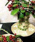 Decorative arrangement wrapped with Natural Green Leaf Jute Twine Rope 2mm 3-Ply with red berries and leaves