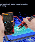 Hands using True RMS Digital Multimeter Go-To Tool For AC DC Voltage And Current, Handy Ohms Meter With Auto Range, D