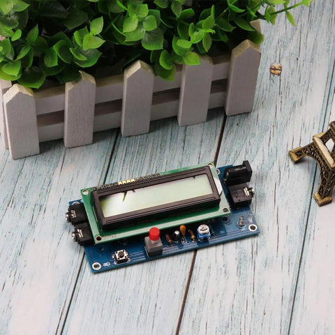 Ham Radio Essential CW Decoder Morse Code Reader And Translator With LCD Display No-Fuss Setup, shown on wooden surface