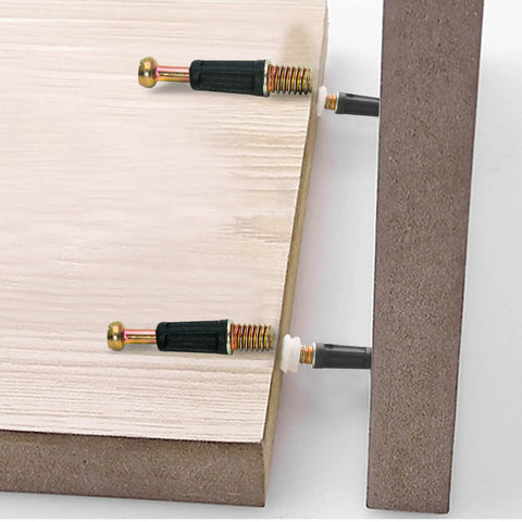 Twenty Four Piece 35 mm Cam Screw And Dowel Pin Kit With Zinc Connectors showing cam screws fastening wooden boards together.