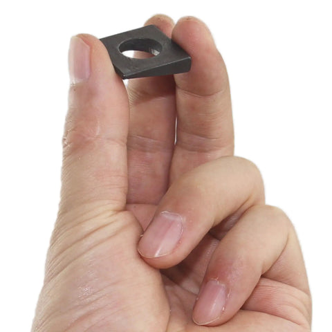 Heavy Duty Beveled Square Washers For Shim Leveling 3/8 Inch Bore Plus 7/8 Width Plain Carbon Steel Oxidized Black Finish held in hand