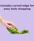 Zero Stress Leaf Stripper For Fresh Kale And Collard Greens With Super Sharp Curved Cutting Edge Quick Herb Chopper Kitchen Gadget in use with chopped herbs.