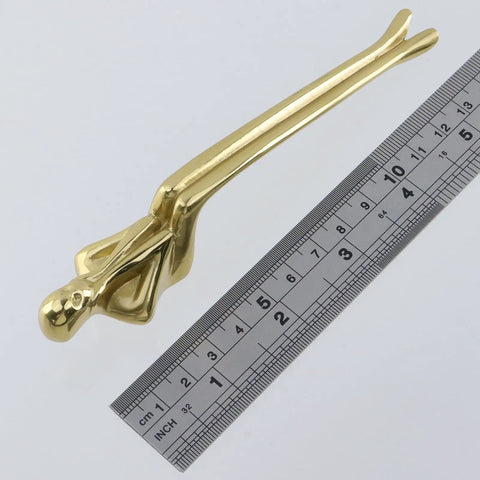 Brass Thinker Shape Cabinet Pulls And Drawer Handles For Cabinets next to ruler, solid brass hardware with figurine design.