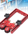 Badass One Way Bearing Stock Roller For Table Saw And Router Woodshop Kickback Blocker on red frame with measurement marks.