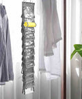 Double Sided Hanging Clothes Organizer Bag Keeps Your Closet Hella Tidy And Super Easy To Grab What You Need For Daily Storage And Simple Home Organization Vibes That Make Your Space Game Strong, grey organizer with pockets, mounted on a rod.